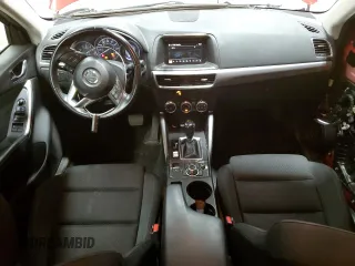 2016 Mazda CX-5 Touring z VIN JM3KE4CY6G0647362, wystawiony jako Copart lot #58081855 z przebiegiem 86 372 mil mil oraz Szkoda całkowita • Salvage title. Historia ofert i sprzedaży dostępna na DreamBid. Obrazek 8.