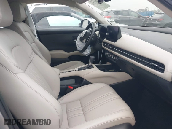 2024 Honda HR-V EX-L z VIN 3CZRZ1H71RM758910, wystawiony jako IAAI lot #42202774 z przebiegiem 8 452 mil mil oraz . Historia ofert i sprzedaży dostępna na DreamBid. Obrazek 5.