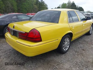 2005 Mercury Grand Marquis LS Premium z VIN 2MHHM75W05X636036, wystawiony jako IAAI lot #41935848 z przebiegiem 182 155 mil mil oraz . Historia ofert i sprzedaży dostępna na DreamBid. Obrazek 4.
