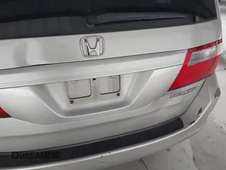 2005 Honda Odyssey EX-L with VIN 5FNRL38615B026205, listed as a IAAI auction lot 42128729 with 172,260 mi miles. Bid and sale history available at carsss.com. Image 16.