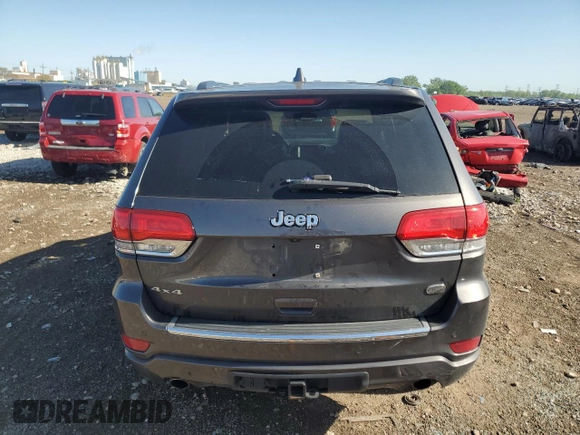 2017 Jeep Grand Cherokee Overland with VIN 1C4RJFCG0HC762612, listed as a Copart auction lot 57400095 with 122,702 mi miles and Salvage title. Bid and sale history available at DreamBid. Image 6.