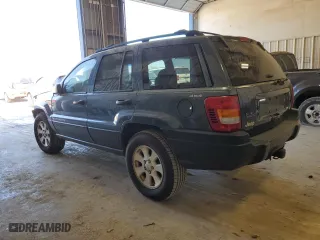 2001 Jeep Grand Cherokee Laredo with VIN 1J4GW48N41C557380, listed as a Copart auction lot 74080604 with 58,005 mi miles and Salvage Title. Bid and sale history available at carsss.com. Image 2.