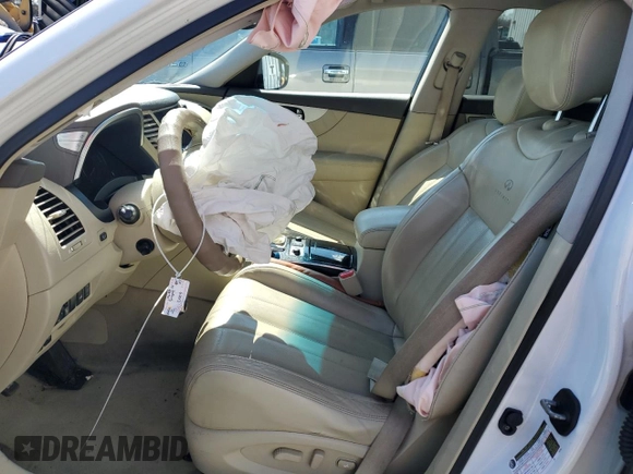 2014 Infiniti QX70 z VIN JN8CS1MU8EM450011, wystawiony jako Copart lot #47757235 z przebiegiem Nie podano mil oraz Szkoda całkowita • Salvage title. Historia ofert i sprzedaży dostępna na DreamBid. Obrazek 7.