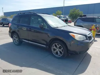 2015 Subaru Forester 2.5i Touring with VIN JF2SJAWC4FH523997, listed as a IAAI auction lot 41884674 with 175,127 mi miles. Bid and sale history available at carsss.com. Image 1.