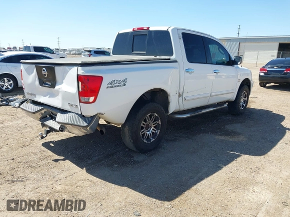 2004 Nissan Titan LE z VIN 1N6AA07B14N528418, wystawiony jako IAAI lot #42281318 z przebiegiem 200 902 mil mil oraz . Historia ofert i sprzedaży dostępna na DreamBid. Obrazek 4.