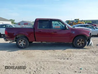 2003 Ford F-150 XLT with VIN 1FTRW07623KB56436, listed as a IAAI auction lot 42563493 with Not provided miles and . Bid and sale history available at DreamBid. Image 13.