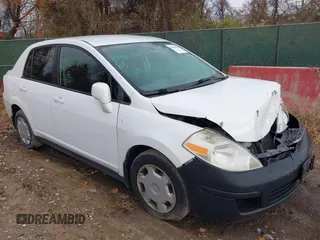 2009 Nissan Versa 1.8 S with VIN 3N1BC11E49L416720, listed as a IAAI auction lot 40960069 with 130,131 mi miles. Bid and sale history available at carsss.com. Image 18.