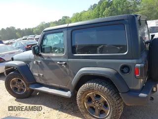2020 Jeep Wrangler Sport S with VIN 1C4GJXAN5LW146068, listed as a IAAI auction lot 42071619 with 51,238 mi miles and . Bid and sale history available at DreamBid. Image 14.
