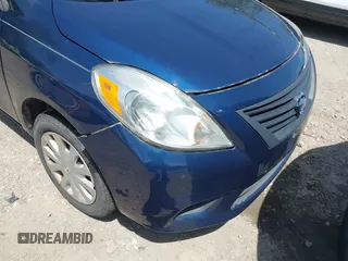 2012 Nissan Versa SV with VIN 3N1CN7AP6CL899654, listed as a IAAI auction lot 42166459 with 121,062 mi miles. Bid and sale history available at carsss.com. Image 6.