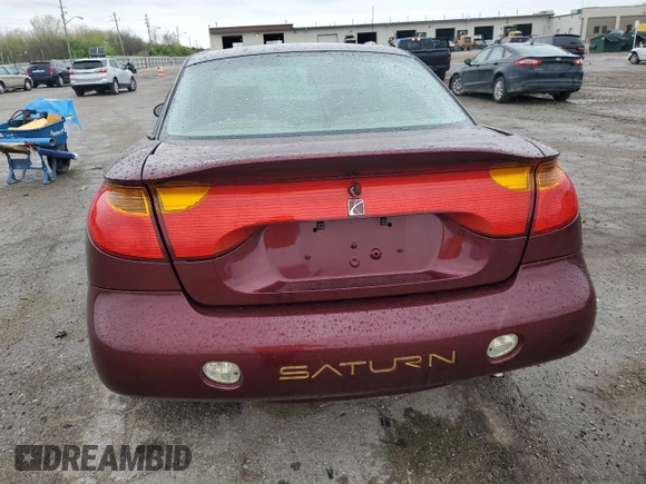 2002 Saturn SC z VIN 1G8ZY12732Z176596, wystawiony jako Copart lot #50506894 z przebiegiem Nie podano mil oraz Szkody całkowita. Historia ofert i sprzedaży dostępna na DreamBid. Obrazek 6.