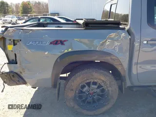 2022 Nissan Frontier SV z VIN 1N6ED1EKXNN659026, wystawiony jako IAAI lot #42050476 z przebiegiem 26 183 mil mil oraz . Historia ofert i sprzedaży dostępna na DreamBid. Obrazek 19.