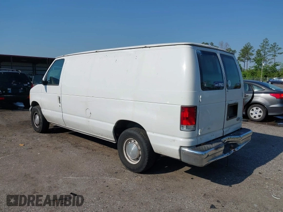 1999 Ford Econoline Cargo with VIN 1FTRE1420XHA34056, listed as a IAAI auction lot 41998411 with 236,267 mi miles. Bid and sale history available at carsss.com. Image 3.