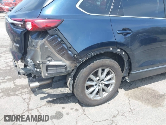2019 Mazda CX-9 Touring z VIN JM3TCBCY6K0331905, wystawiony jako IAAI lot #42157842 z przebiegiem 84 211 mil mil oraz . Historia ofert i sprzedaży dostępna na DreamBid. Obrazek 19.