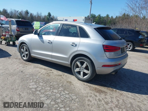 2015 Audi Q3 2.0T Premium Plus with VIN WA1EFCFSXFR010015, listed as a IAAI auction lot 42099410 with 142,117 mi miles. Bid and sale history available at carsss.com. Image 3.