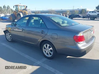 2005 Toyota Camry LE with VIN 4T1BF30K55U619313, listed as a IAAI auction lot 41854001 with 89,982 mi miles and . Bid and sale history available at DreamBid. Image 3.