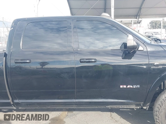 2021 Ram 2500 Laramie z VIN 3C6UR5FL7MG590681, wystawiony jako IAAI lot #41679165 z przebiegiem 28 482 mil mil oraz . Historia ofert i sprzedaży dostępna na DreamBid. Obrazek 13.