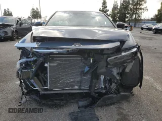 2025 Toyota Crown XLE with VIN JTDAAAAF7S3032651, listed as a Copart auction lot 43737025 with 14,812 mi miles and Salvage Title. Bid and sale history available at carsss.com. Image 5.