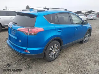 2018 Toyota RAV4 LE with VIN JTMBFREVXJJ739954, listed as a IAAI auction lot 41739873 with 13,726 mi miles. Bid and sale history available at carsss.com. Image 4.