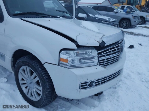 2012 Lincoln Navigator L with VIN 5LMJJ3J59CEL07440, listed as a IAAI auction lot 41257032 with 100,073 mi miles. Bid and sale history available at carsss.com. Image 6.