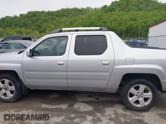 2012 Honda Ridgeline RTL with VIN 5FPYK1F58CB454385, listed as a IAAI auction lot 42212805 with 207,874 mi miles and . Bid and sale history available at DreamBid. Image 14.