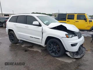 2021 Jeep Grand Cherokee Laredo X with VIN 1C4RJEAG4MC597428, listed as a IAAI auction lot 42179555 with 61,793 mi miles and . Bid and sale history available at DreamBid. Image 1.
