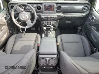 2023 Jeep Wrangler Sport S with VIN 1C4HJXDG0PW629815, listed as a Copart auction lot 53826875 with 9,260 mi miles and Salvage Title. Bid and sale history available at DreamBid. Image 8.