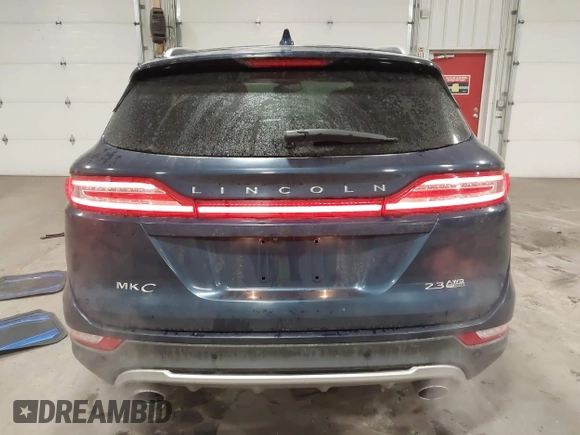 2015 Lincoln MKC with VIN 5LMTJ2AH0FUJ28744, listed as a IAAI auction lot 41888775 with 145,872 mi miles. Bid and sale history available at carsss.com. Image 16.