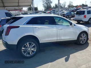 2023 Cadillac XT5 AWD Premium Luxury with VIN 1GYKNDRS4PZ195431, listed as a IAAI auction lot 41714459 with 13,207 mi miles and . Bid and sale history available at DreamBid. Image 13.