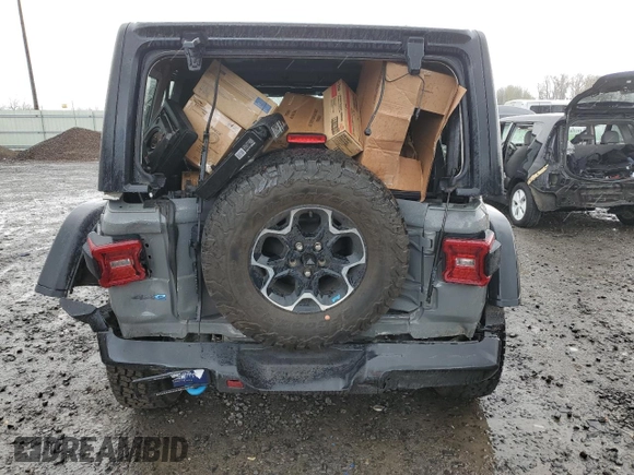 2023 Jeep Wrangler Rubicon with VIN 1C4JJXR68PW696504, listed as a Copart auction lot 50996915 with 44,947 mi miles and Salvage title. Bid and sale history available at DreamBid. Image 6.