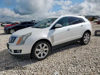 2014 Cadillac SRX Performance Collection with VIN 3GYFNCE39ES687733, listed as a Copart auction lot 62770665 with 151,714 mi miles and Salvage title. Bid and sale history available at DreamBid. Image 1.