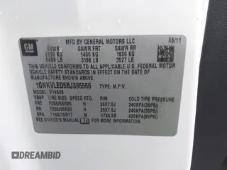 2011 Chevrolet Traverse LTZ with VIN 1GNKVLED5BJ385566, listed as a IAAI auction lot 40530314 with 166,155 mi miles and . Bid and sale history available at DreamBid. Image 9.