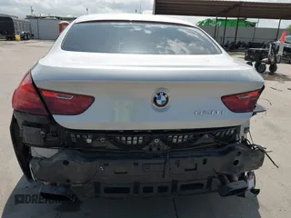 2015 BMW 6 Series 650i z VIN WBA6B2C55FGB99196, wystawiony jako IAAI lot #42107698 z przebiegiem 74 393 mil mil oraz . Historia ofert i sprzedaży dostępna na DreamBid. Obrazek 19.