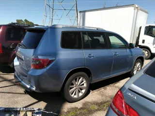 2009 Toyota Highlander Hybrid Limited with VIN JTEEW44A392028371, listed as a IAAI auction lot 41826565 with 210,309 mi miles. Bid and sale history available at carsss.com. Image 4.