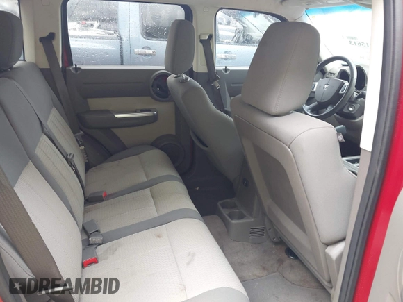 2007 Dodge Nitro SLT with VIN 1D8GT58K77W640112, listed as a IAAI auction lot 42015613 with 220,061 mi miles. Bid and sale history available at carsss.com. Image 8.