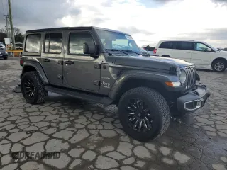 2022 Jeep Wrangler Unlimited Sahara Altitude with VIN 1C4HJXEG9NW269598, listed as a Copart auction lot 80495964 with 23,869 mi miles and Salvage title. Bid and sale history available at DreamBid. Image 4.