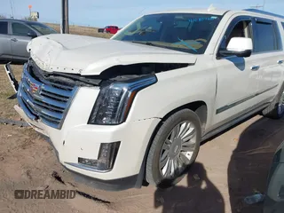 2015 Cadillac Escalade ESV Platinum z VIN 1GYS4UKJ3FR564718, wystawiony jako IAAI lot #41085166 z przebiegiem Nie podano mil oraz . Historia ofert i sprzedaży dostępna na DreamBid. Obrazek 20.