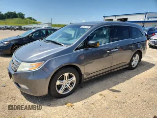 2012 Honda Odyssey Touring with VIN 5FNRL5H97CB103954, listed as a Copart auction lot 62941445 with 241,877 mi miles and Clean title. Bid and sale history available at DreamBid. Image 1.