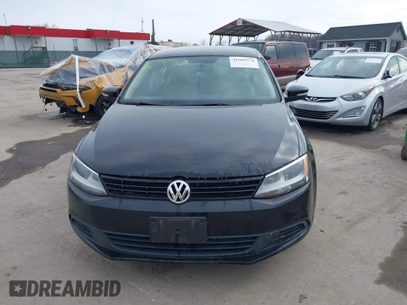 2012 Volkswagen Jetta TDI w/Premium with VIN 3VWLL7AJXCM073394, listed as a IAAI auction lot 41602574 with 159,668 mi miles and . Bid and sale history available at DreamBid. Image 12.