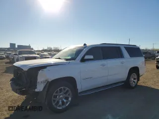 2015 GMC Yukon XL SLE with VIN 1GKS2GKC1FR154132, listed as a Copart auction lot 88709955 with Not Provided miles and Salvage Title. Bid and sale history available at carsss.com. Image 1.
