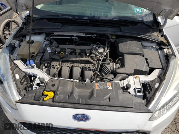 2016 Ford Focus SE с VIN 1FADP3F29GL323601, выставлен на аукционе Copart как лот 56407185 с пробегом 57 000 миль миль и Списание • Salvage title. История ставок и продаж доступна на DreamBid. Изображение 11.
