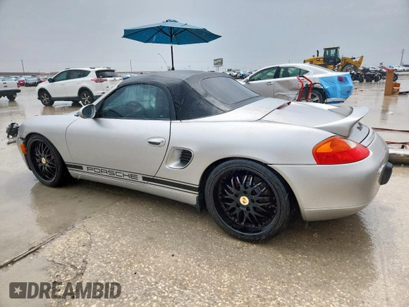 2002 Porsche Boxster S with VIN WP0CB29802S660218, listed as a Copart auction lot 62540525 with 129,940 mi miles and Salvage title. Bid and sale history available at DreamBid. Image 2.