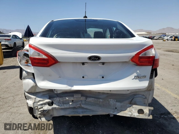 2014 Ford Fiesta S с VIN 3FADP4AJ2EM171595, выставлен на аукционе Copart как лот 60674985 с пробегом 123 805 миль миль и Списание • Salvage title. История ставок и продаж доступна на DreamBid. Изображение 6.