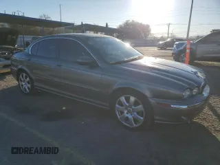2004 Jaguar X-Type with VIN SAJEA51C74WD70684, listed as a Copart auction lot 46536395 with 155,184 mi miles and Salvage Title. Bid and sale history available at carsss.com. Image 4.