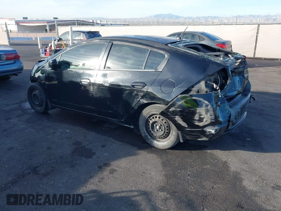 2010 Honda Insight LX with VIN JHMZE2H59AS006887, listed as a IAAI auction lot 41159288 with 263,497 mi miles and . Bid and sale history available at DreamBid. Image 3.