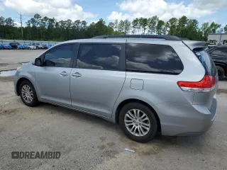 2011 Toyota Sienna XLE AAS with VIN 5TDYK3DC2BS011343, listed as a Copart auction lot 61223675 with 187,206 mi miles and Salvage title. Bid and sale history available at DreamBid. Image 2.