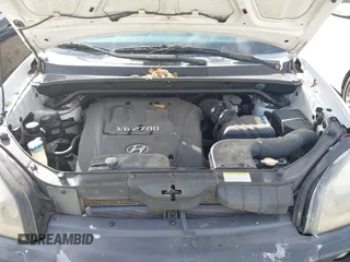 2007 Hyundai Tucson SE with VIN KM8JN12D77U638627, listed as a IAAI auction lot 41551224 with 156,125 mi miles. Bid and sale history available at carsss.com. Image 10.