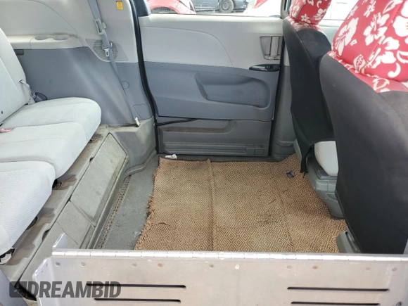2012 Toyota Sienna with VIN 5TDZK3DC2CS272641, listed as a Copart auction lot 53378905 with 115,153 mi miles and Salvage title. Bid and sale history available at DreamBid. Image 11.