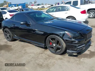 2015 Mercedes-Benz SLK 250 z VIN WDDPK4HAXFF100194, wystawiony jako IAAI lot #42509988 z przebiegiem 99 823 mil mil oraz . Historia ofert i sprzedaży dostępna na DreamBid. Obrazek 1.