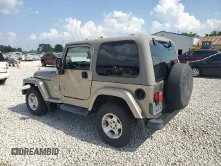 2003 Jeep Wrangler Sahara with VIN 1J4FA59S53P369077, listed as a Copart auction lot 61445025 with 147,904 mi miles and Clean title. Bid and sale history available at DreamBid. Image 2.