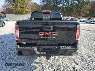 2022 GMC Canyon 4WD AT4 w/Cloth with VIN 1GTG6FEN2N1240091, listed as a Copart auction lot 85764964 with 25,881 mi miles and Salvage Title. Bid and sale history available at carsss.com. Image 6.